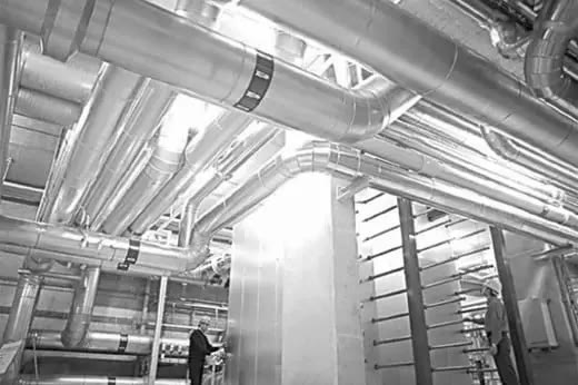 Insulated pipes in an industrial building